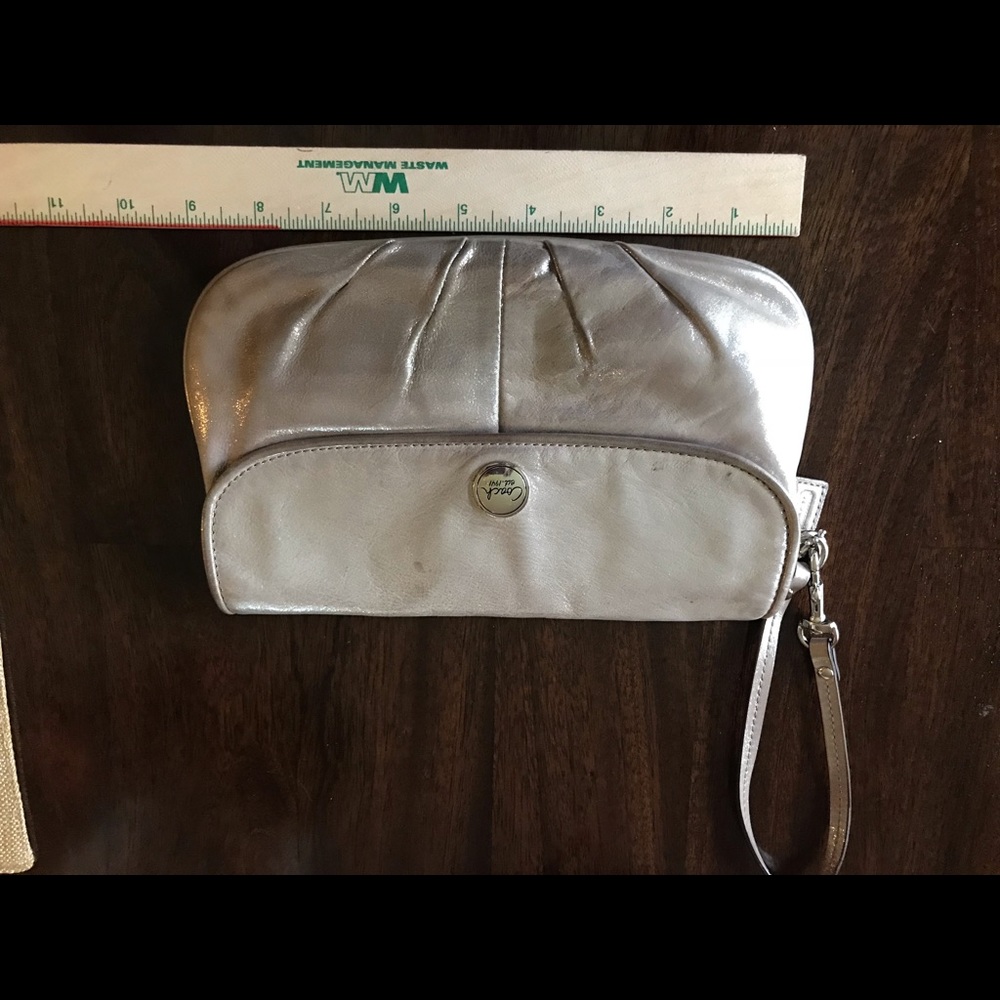 Coach gold wristlet